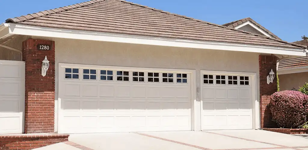 Residential garage door repair service for a double garage door in Dayton, OH