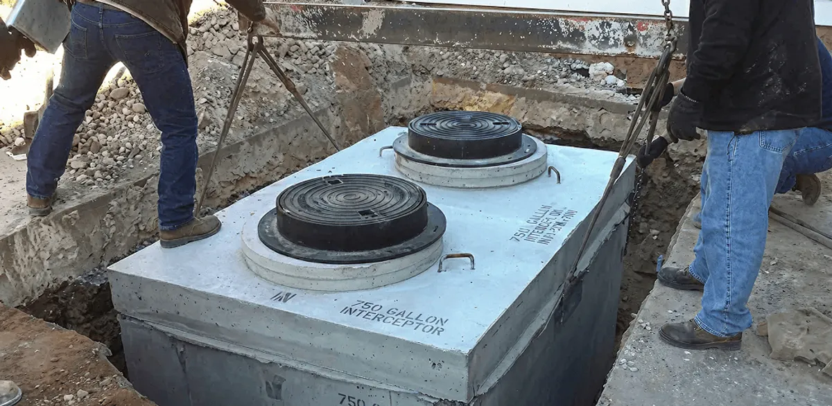 Grease trap installation for a commercial property drainage system in Dayton, OH