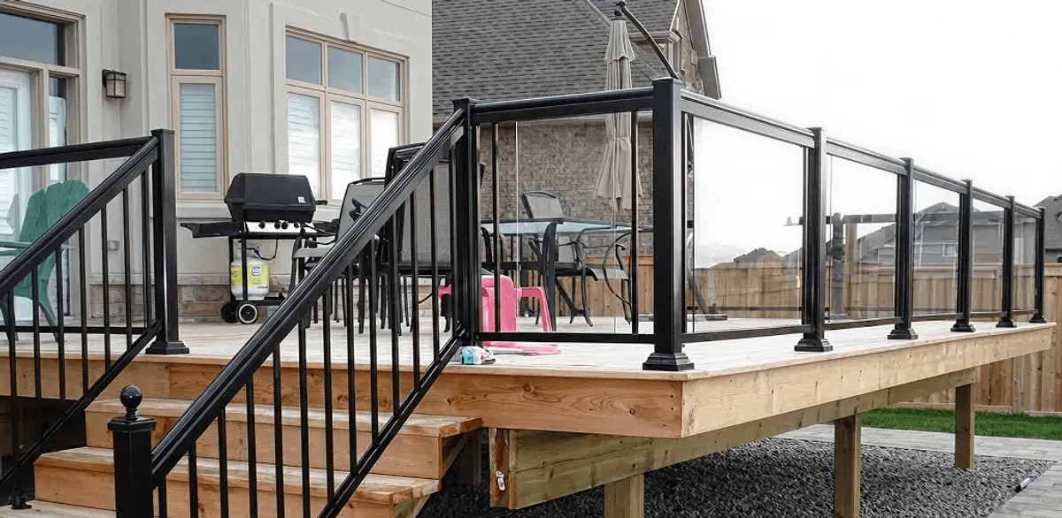 Handrail installation on a deck staircase for safety and code compliance in Dayton, OH
