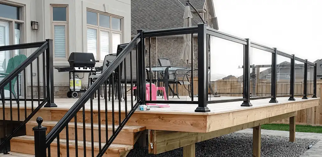 Handrail installation on a deck staircase for safety and code compliance in Dayton, OH